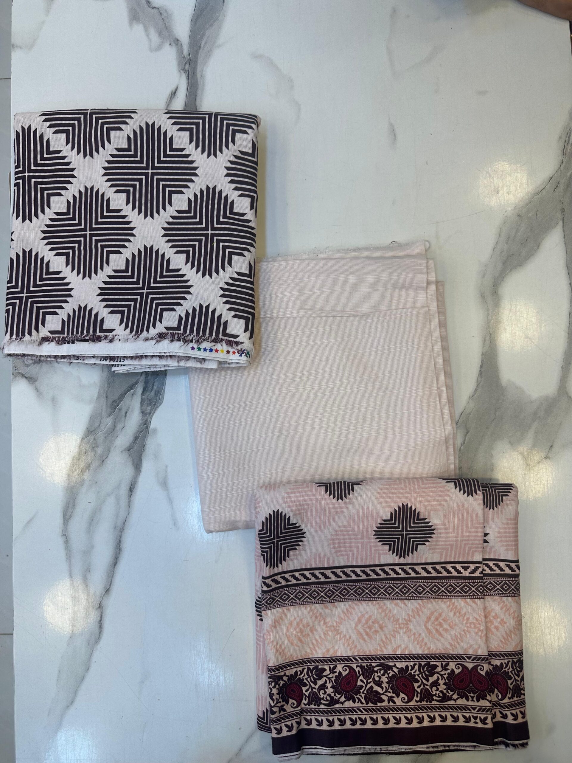 WhatsApp Image 2026-09-20 at 2.38.07 PM Geometric Printed 3-Piece Khaddar Unstitched Suit Onlay Rs. 2000 - Image 1